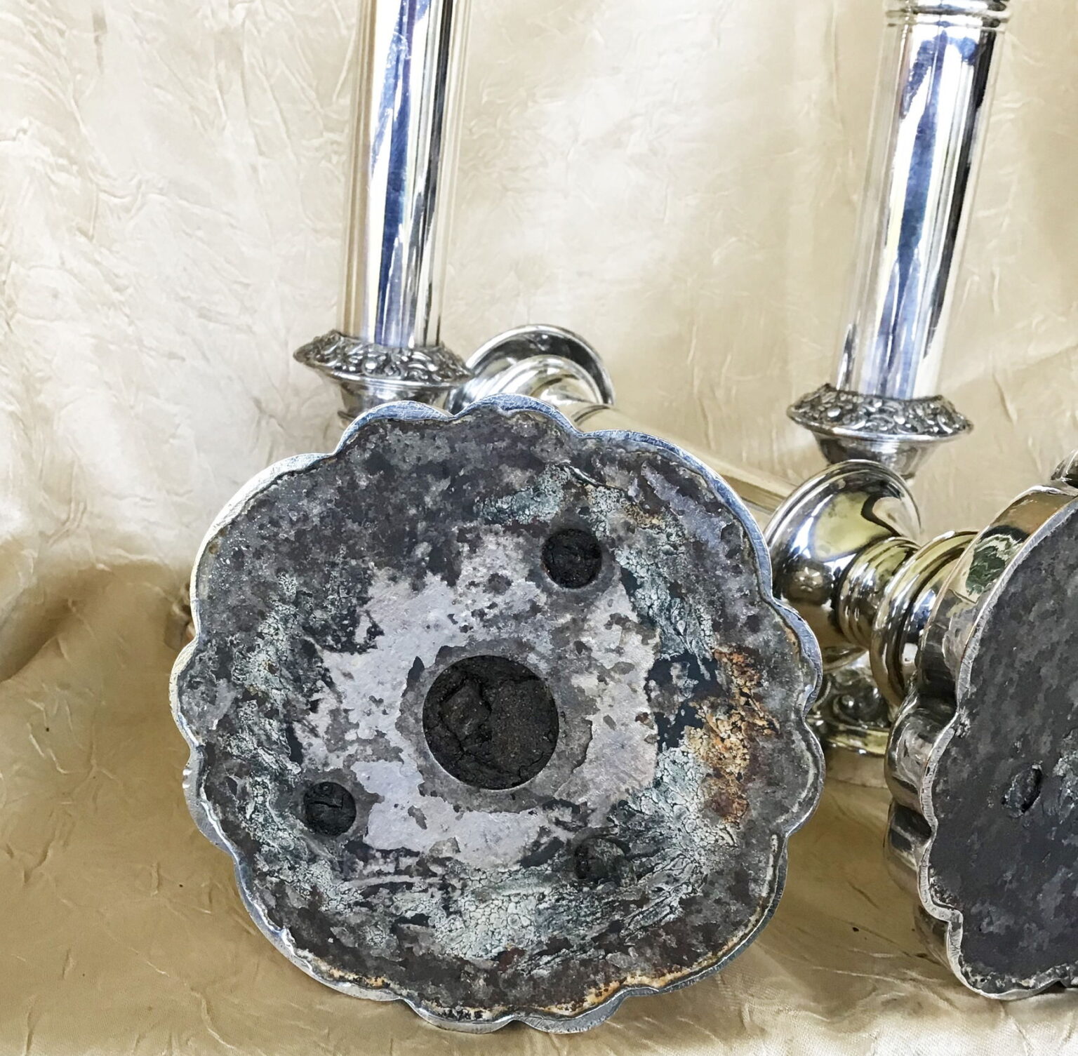 How do I identify the value of antique silver candlesticks?